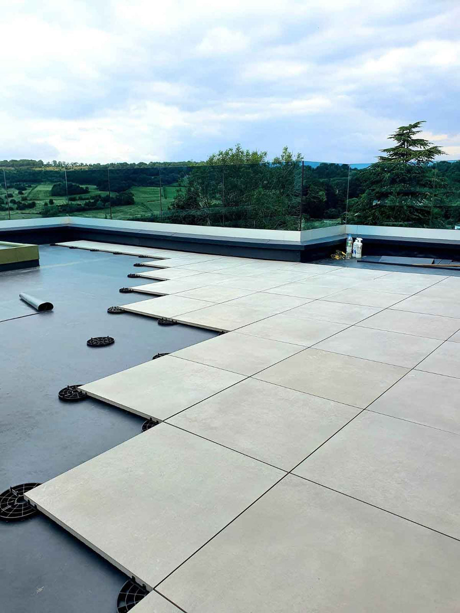 Light Grey 60x60 tiles balcony project tectonic paving support pad